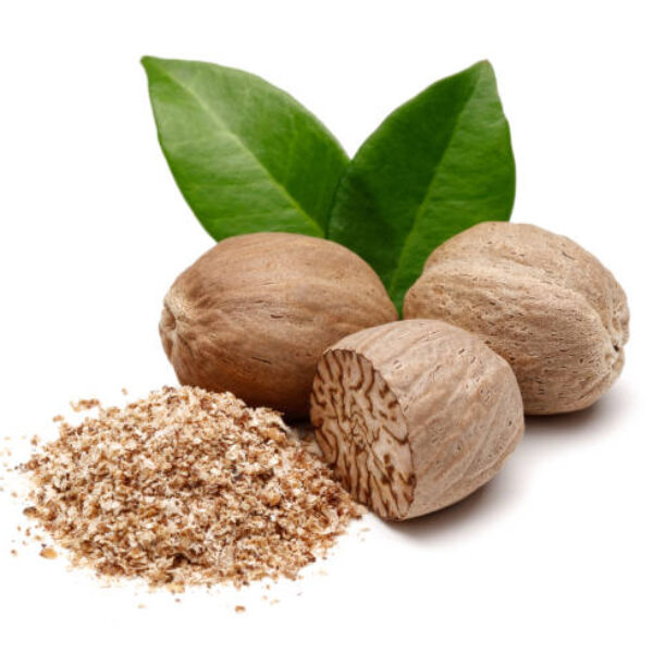Whole and grated nutmeg with leaves isolated on white background