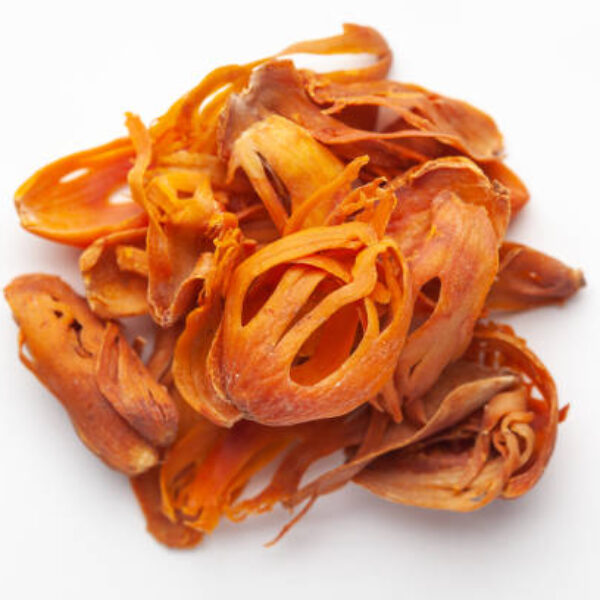 Macro close-up of Organic mace (Myristica fragrans) on white background. Pile of Indian Aromatic Spice. Top view